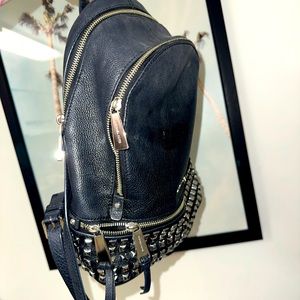 MK black leather studded backpack